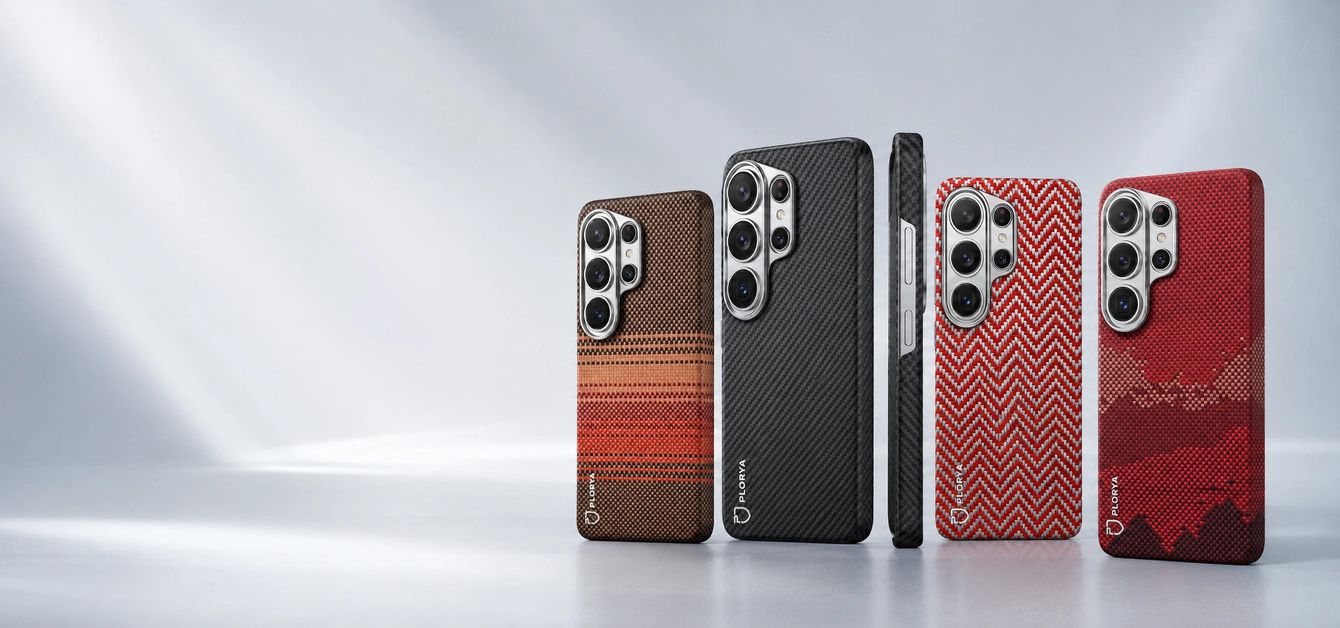 Four smartphone cases with different designs on a white background